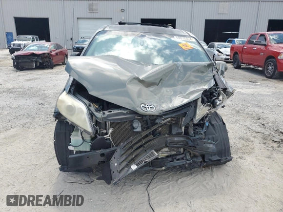 2014 Toyota Sienna LE AAS with VIN 5TDKK3DC5ES423802, listed as a Copart auction lot 69075824 with Not Provided miles and Salvage Title. Bid and sale history available at DreamBid. Image 5.