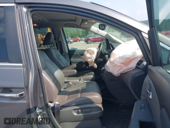 2014 Honda Odyssey EX-L with VIN 5FNRL5H6XEB121390, listed as a IAAI auction lot 42480217 with 291,766 mi miles and . Bid and sale history available at DreamBid. Image 5.