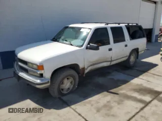 1999 Chevrolet Suburban with VIN 3GNFK16R4XG190883, listed as a Copart auction lot 58324415 with 228,782 mi miles and Salvage title. Bid and sale history available at DreamBid. Image 1.