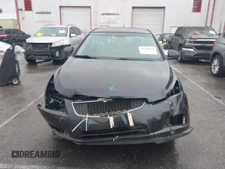 2014 Chevrolet Cruze LS z VIN 1G1PA5SHXE7351632, wystawiony jako IAAI lot #41795779 z przebiegiem 144 948 mil mil oraz . Historia ofert i sprzedaży dostępna na DreamBid. Obrazek 13.