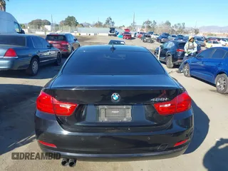 2014 BMW 4 Series 428i with VIN WBA3N7C55EK221259, listed as a IAAI auction lot 41322781 with 100,274 mi miles and . Bid and sale history available at carsss.com. Image 16.