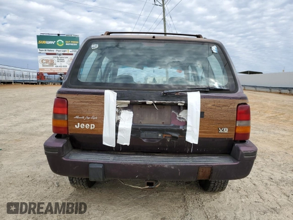 1993 Jeep Grand Wagoneer z VIN 1J4GZ88Y6PC711184, wystawiony jako Copart lot #46785895 z przebiegiem 280 127 mil mil oraz Czysty tytuł • Clean title. Historia ofert i sprzedaży dostępna na DreamBid. Obrazek 6.