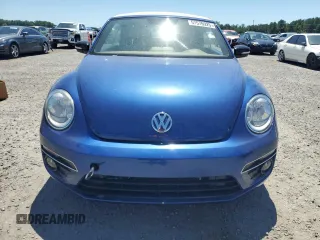 2013 Volkswagen Beetle z VIN 3VW7S7AT8DM826556, wystawiony jako Copart lot #57576925 z przebiegiem 62 951 mil mil oraz Tytuł czysty. Historia ofert i sprzedaży dostępna na DreamBid. Obrazek 5.