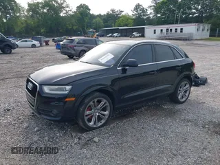2015 Audi Q3 Prestige z VIN WA1GFCFS5FR000694, wystawiony jako IAAI lot #42246403 z przebiegiem 93 504 mil mil oraz . Historia ofert i sprzedaży dostępna na DreamBid. Obrazek 2.