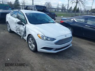 2017 Ford Fusion SE z VIN 3FA6P0H71HR397078, wystawiony jako IAAI lot #41988639 z przebiegiem 73 893 mil mil oraz . Historia ofert i sprzedaży dostępna na DreamBid. Obrazek 1.