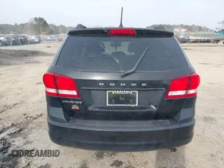 2013 Dodge Journey SE with VIN 3C4PDCAB0DT702977, listed as a IAAI auction lot 41797817 with 150,317 mi miles. Bid and sale history available at carsss.com. Image 15.