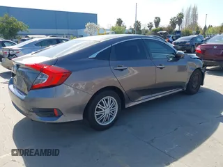 2016 Honda Civic Sedan LX with VIN 19XFC2F53GE213624, listed as a IAAI auction lot 41993834 with 112,052 mi miles. Bid and sale history available at carsss.com. Image 4.