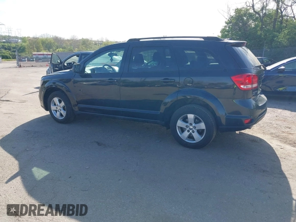 2012 Dodge Journey SXT with VIN 3C4PDDBGXCT160348, listed as a IAAI auction lot 42096075 with 135,095 mi miles and . Bid and sale history available at DreamBid. Image 3.