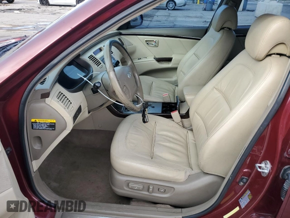 2009 Hyundai Azera Limited with VIN KMHFC46F49A358970, listed as a Copart auction lot 82125714 with 208,090 mi miles and Salvage Title. Bid and sale history available at DreamBid. Image 7.
