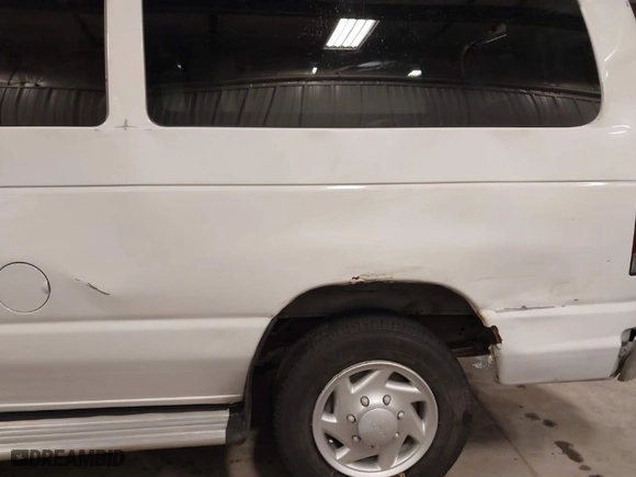 2007 Ford Econoline Wagon XL with VIN 1FMNE11L87DA58507, listed as a IAAI auction lot 41128969 with 143,383 mi miles. Bid and sale history available at carsss.com. Image 15.