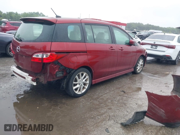 2012 Mazda 5 Grand Touring with VIN JM1CW2DL8C0142628, listed as a IAAI auction lot 42350676 with 84,764 mi miles and . Bid and sale history available at DreamBid. Image 4.