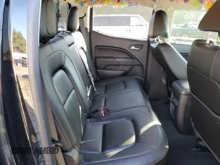 2018 GMC Canyon 4WD SLT with VIN 1GTG6DEN4J1296628, listed as a Copart auction lot 77135484 with 74,486 mi miles and Salvage Title. Bid and sale history available at carsss.com. Image 10.