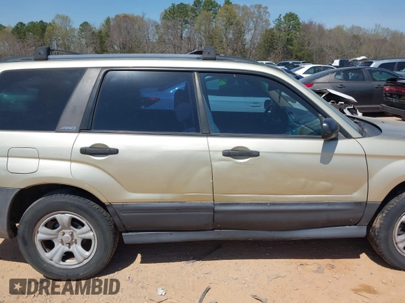 2003 Subaru Forester X z VIN JF1SG63613H715162, wystawiony jako IAAI lot #41897812 z przebiegiem 163 895 mil mil oraz . Historia ofert i sprzedaży dostępna na DreamBid. Obrazek 13.