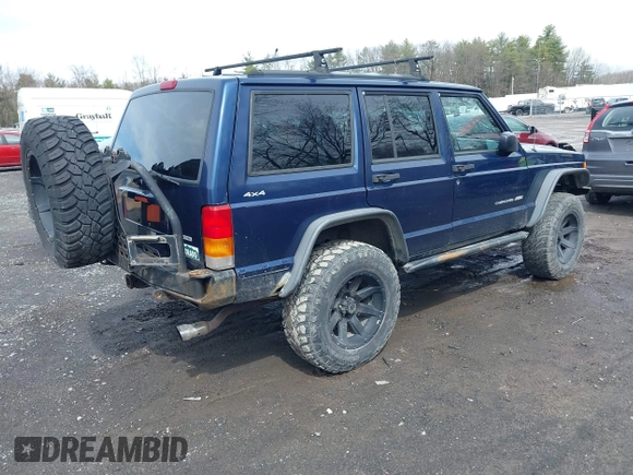 2000 Jeep Cherokee Classic with VIN 1J4FF58SXYL163514, listed as a IAAI auction lot 41920054 with 259,677 mi miles. Bid and sale history available at carsss.com. Image 4.