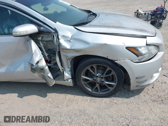 2012 Nissan Maxima SV with VIN 1N4AA5AP6CC841081, listed as a IAAI auction lot 42428824 with 131,026 mi miles and . Bid and sale history available at DreamBid. Image 6.