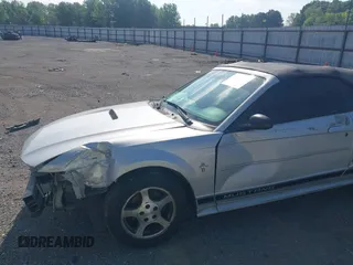 2002 Ford Mustang Deluxe with VIN 1FAFP44432F205991, listed as a IAAI auction lot 42144709 with 138,119 mi miles and . Bid and sale history available at DreamBid. Image 13.