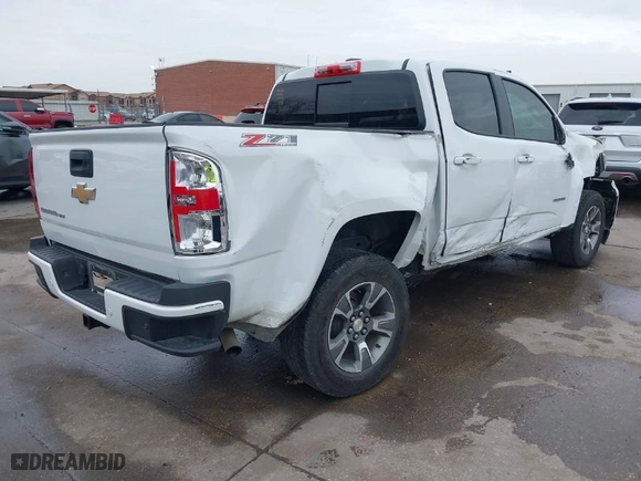 2019 Chevrolet Colorado 4WD Z71 with VIN 1GCGTDEN3K1317883, listed as a IAAI auction lot 41439010 with 34,306 mi miles. Bid and sale history available at carsss.com. Image 4.