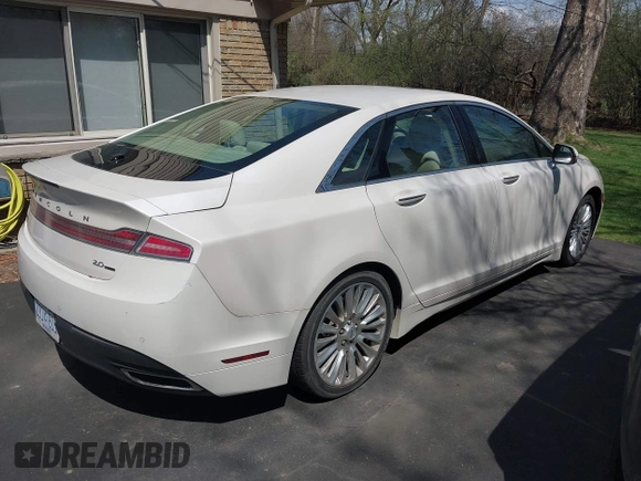 2014 Lincoln MKZ with VIN 3LN6L2G95ER827769, listed as a IAAI auction lot 42109075 with 154,000 mi miles. Bid and sale history available at carsss.com. Image 4.