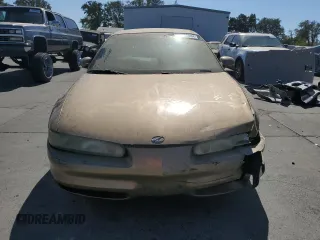 1998 Oldsmobile Intrigue GL z VIN 1G3WS52K1WF373652, wystawiony jako Copart lot #72822084 z przebiegiem 221 028 mil mil oraz Szkoda całkowita • Salvage title. Historia ofert i sprzedaży dostępna na DreamBid. Obrazek 5.