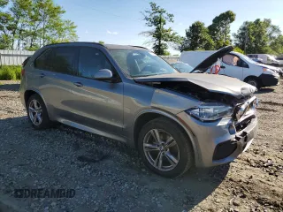 2015 BMW X5 xDrive35i z VIN 5UXKR0C57F0K61171, wystawiony jako Copart lot #57555405 z przebiegiem 119 664 mil mil oraz Szkoda całkowita • Salvage title. Historia ofert i sprzedaży dostępna na DreamBid. Obrazek 4.