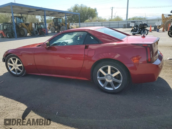 2004 Cadillac XLR z VIN 1G6YV34A345600127, wystawiony jako Copart lot #68859774 z przebiegiem 40 727 mil mil oraz Szkody całkowita. Historia ofert i sprzedaży dostępna na DreamBid. Obrazek 2.
