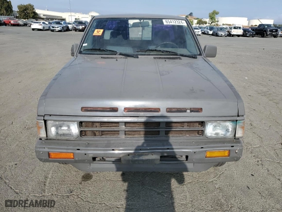 1989 Nissan Hardbody King Cab 2WD with VIN 1N6ND16S2KC377484, listed as a Copart auction lot 65412324 with NaN miles and Salvage Title. Bid and sale history available at carsss.com. Image 5.