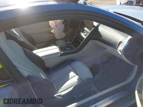 2019 BMW 8 Series M850i xDrive with VIN WBABC4C54KBU96780, listed as a IAAI auction lot 41015686 with 15,451 mi miles and . Bid and sale history available at DreamBid. Image 5.