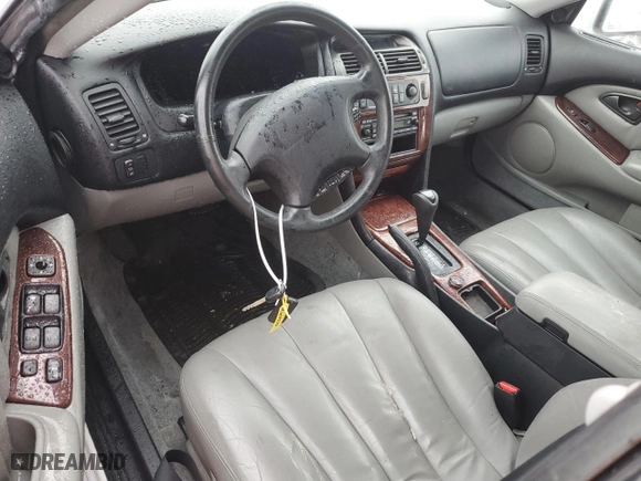 2003 Mitsubishi Diamante LS with VIN 6MMAP67P43T002798, listed as a Copart auction lot 80368974 with 134,099 mi miles and Clean Title. Bid and sale history available at carsss.com. Image 8.