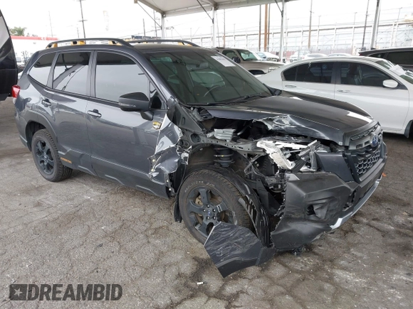 2023 Subaru Forester Wilderness with VIN JF2SKAMC4PH412075, listed as a IAAI auction lot 41885690 with 29,935 mi miles and . Bid and sale history available at DreamBid. Image 1.