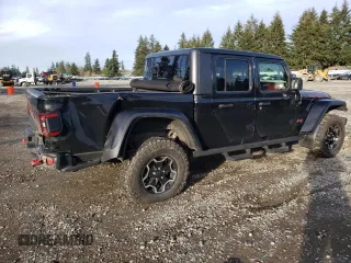 2021 Jeep Gladiator Rubicon with VIN 1C6JJTBG5ML500423, listed as a Copart auction lot 46954765 with 82,483 mi miles and Salvage title. Bid and sale history available at DreamBid. Image 3.