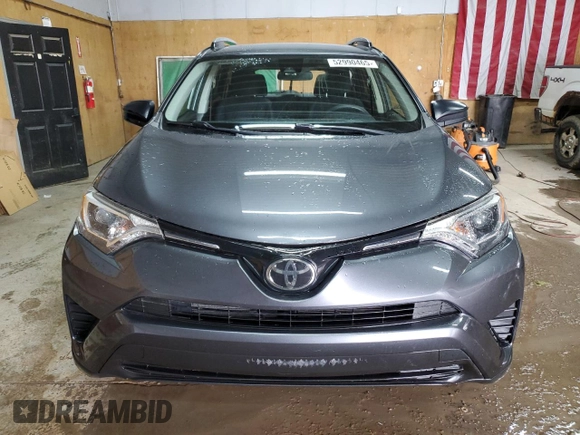 2017 Toyota RAV4 LE with VIN JTMBFREVXHD219410, listed as a Copart auction lot 52990465 with 104,723 mi miles and Clean Title. Bid and sale history available at DreamBid. Image 5.