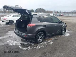 2016 Toyota RAV4 LE with VIN JTMZFREV5GJ093472, listed as a IAAI auction lot 41332037 with 212,869 mi miles. Bid and sale history available at carsss.com. Image 4.