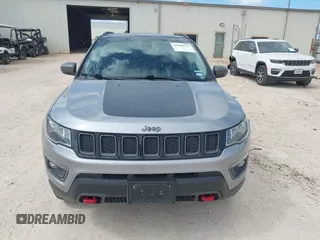 2020 Jeep Compass Trailhawk z VIN 3C4NJDDB5LT171727, wystawiony jako IAAI lot #41844523 z przebiegiem 103 952 mil mil oraz . Historia ofert i sprzedaży dostępna na DreamBid. Obrazek 12.