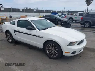 2012 Ford Mustang Premium with VIN 1ZVBP8AM6C5234877, listed as a IAAI auction lot 41911274 with 119,512 mi miles and . Bid and sale history available at DreamBid. Image 1.