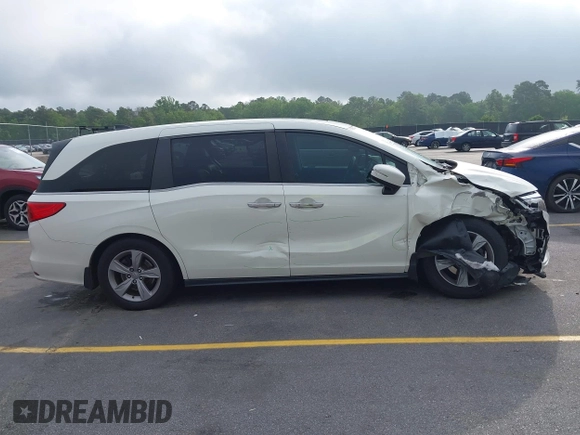 2019 Honda Odyssey EX-L with VIN 5FNRL6H70KB083596, listed as a IAAI auction lot 42072667 with 153,087 mi miles and . Bid and sale history available at DreamBid. Image 13.