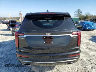 2021 Cadillac XT6 Premium Luxury z VIN 1GYKPDRS6MZ150397, wystawiony jako Copart lot #85137654 z przebiegiem 52 305 mil mil oraz Szkoda całkowita • Salvage title. Historia ofert i sprzedaży dostępna na DreamBid. Obrazek 6.
