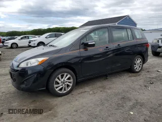 2015 Mazda 5 Sport z VIN JM1CW2BL7F0190886, wystawiony jako Copart lot #57467445 z przebiegiem 95 778 mil mil oraz Czysty tytuł • Clean title. Historia ofert i sprzedaży dostępna na DreamBid. Obrazek 1.