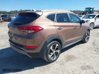 2017 Hyundai Tucson Sport with VIN KM8J3CA25HU347658, listed as a IAAI auction lot 41801178 with 92,857 mi miles. Bid and sale history available at carsss.com. Image 4.