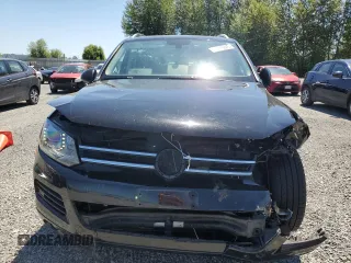 2013 Volkswagen Touareg Lux with VIN WVGEF9BP0DD001565, listed as a Copart auction lot 63070845 with 123,788 mi miles and Salvage title. Bid and sale history available at DreamBid. Image 5.