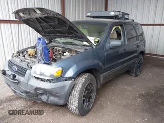 2006 Ford Escape XLT z VIN 1FMCU93126KB09191, wystawiony jako IAAI lot #41700899 z przebiegiem 123 345 mil mil oraz . Historia ofert i sprzedaży dostępna na DreamBid. Obrazek 17.