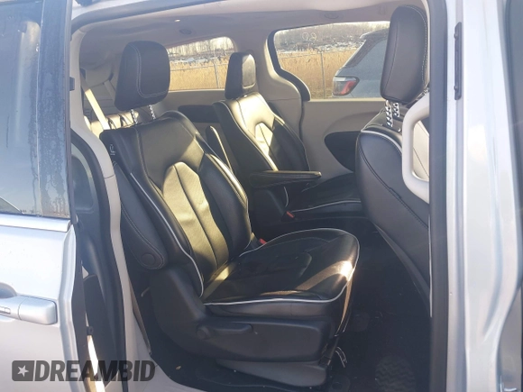 2023 Chrysler Pacifica Hybrid Limited with VIN 2C4RC1S72PR588627, listed as a IAAI auction lot 42063631 with 52,799 mi miles and . Bid and sale history available at DreamBid. Image 8.