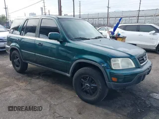 2000 Honda CR-V SE with VIN JHLRD1875YS022873, listed as a IAAI auction lot 42034984 with 210,853 mi miles. Bid and sale history available at carsss.com. Image 1.