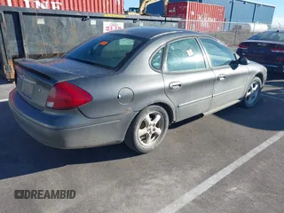 2002 Ford Taurus SES Standard with VIN 1FAFP55S32G118041, listed as a IAAI auction lot 41366321 with 193,533 mi miles. Bid and sale history available at carsss.com. Image 4.