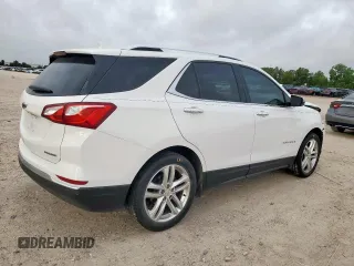 2020 Chevrolet Equinox Premier z VIN 2GNAXNEVXL6226096, wystawiony jako Copart lot #56744635 z przebiegiem 33 594 mil mil oraz Szkoda całkowita • Salvage title. Historia ofert i sprzedaży dostępna na DreamBid. Obrazek 3.