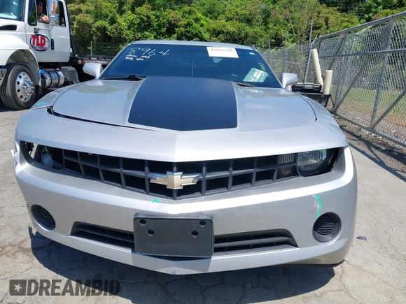 2013 Chevrolet Camaro LS z VIN 2G1FA1E37D9113674, wystawiony jako IAAI lot #42092399 z przebiegiem 138 908 mil mil oraz . Historia ofert i sprzedaży dostępna na DreamBid. Obrazek 12.