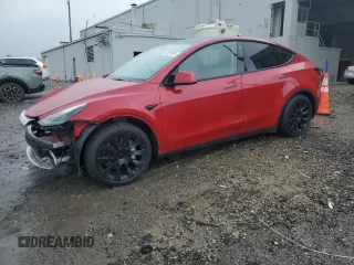 2023 Tesla Model Y Long Range z VIN 7SAYGAEE9PF591713, wystawiony jako Copart lot #57935205 z przebiegiem 37 166 mil mil oraz Szkoda całkowita • Salvage title. Historia ofert i sprzedaży dostępna na DreamBid. Obrazek 1.