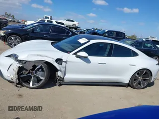 2021 Porsche Taycan 4S z VIN WP0AB2Y12MSA43873, wystawiony jako IAAI lot #41703233 z przebiegiem 24 452 mil mil oraz . Historia ofert i sprzedaży dostępna na DreamBid. Obrazek 14.