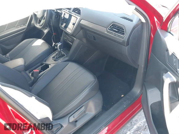 2024 Volkswagen Tiguan SE with VIN 3VVNB7AX5RM061571, listed as a IAAI auction lot 41837016 with 4,969 mi miles and . Bid and sale history available at DreamBid. Image 5.