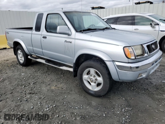 2000 Nissan Frontier XE with VIN 1N6ED26T0YC314102, listed as a Copart auction lot 83678264 with 174,419 mi miles and Salvage title. Bid and sale history available at DreamBid. Image 4.