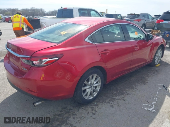 2016 Mazda 6 i Sport with VIN JM1GJ1U53G1409105, listed as a IAAI auction lot 41828135 with 136,812 mi miles and . Bid and sale history available at DreamBid. Image 4.